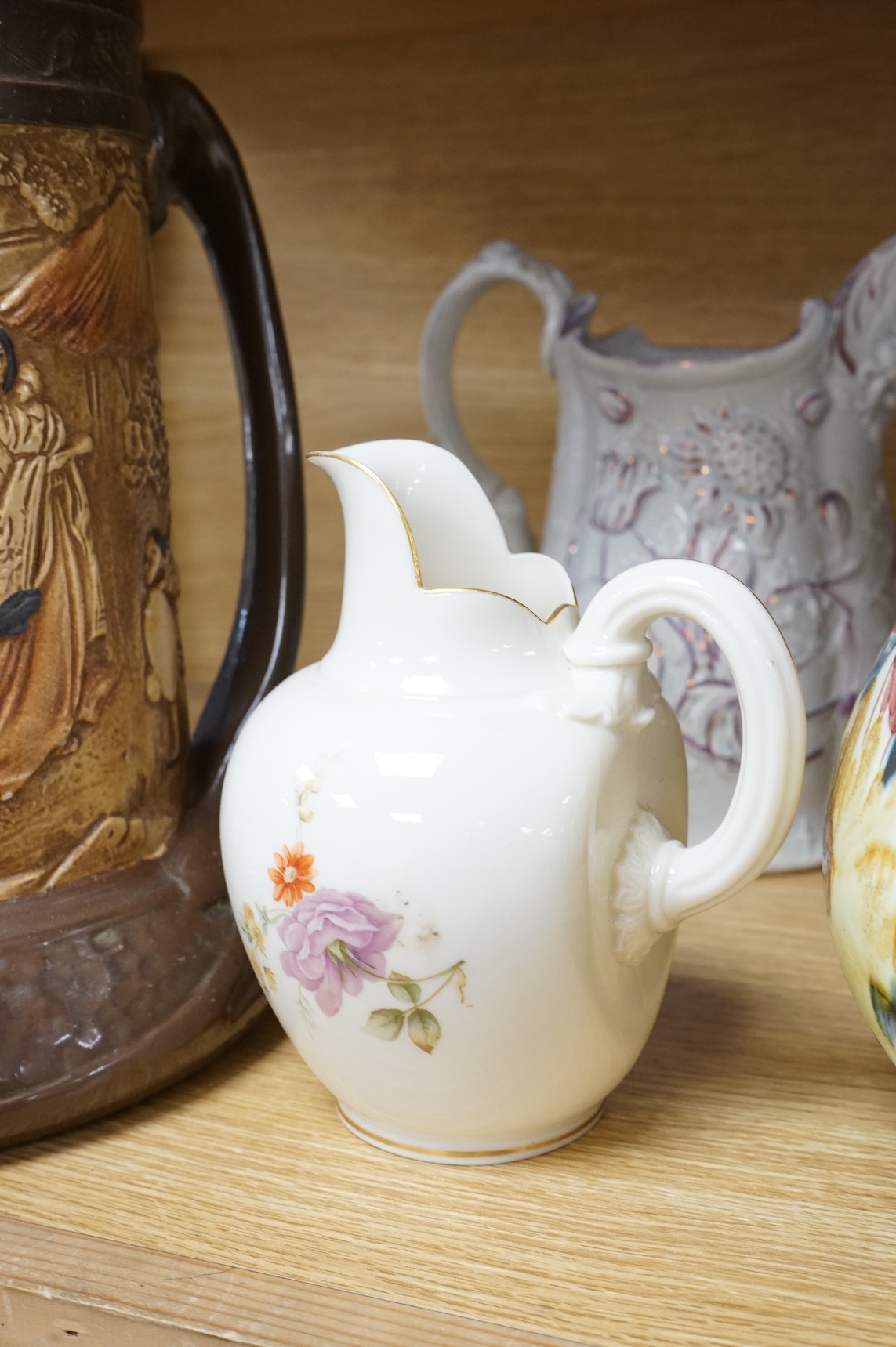 A collection of seven various ceramic vessels including Bretby, Poole, Worcester, continental art pottery etc. 26cm